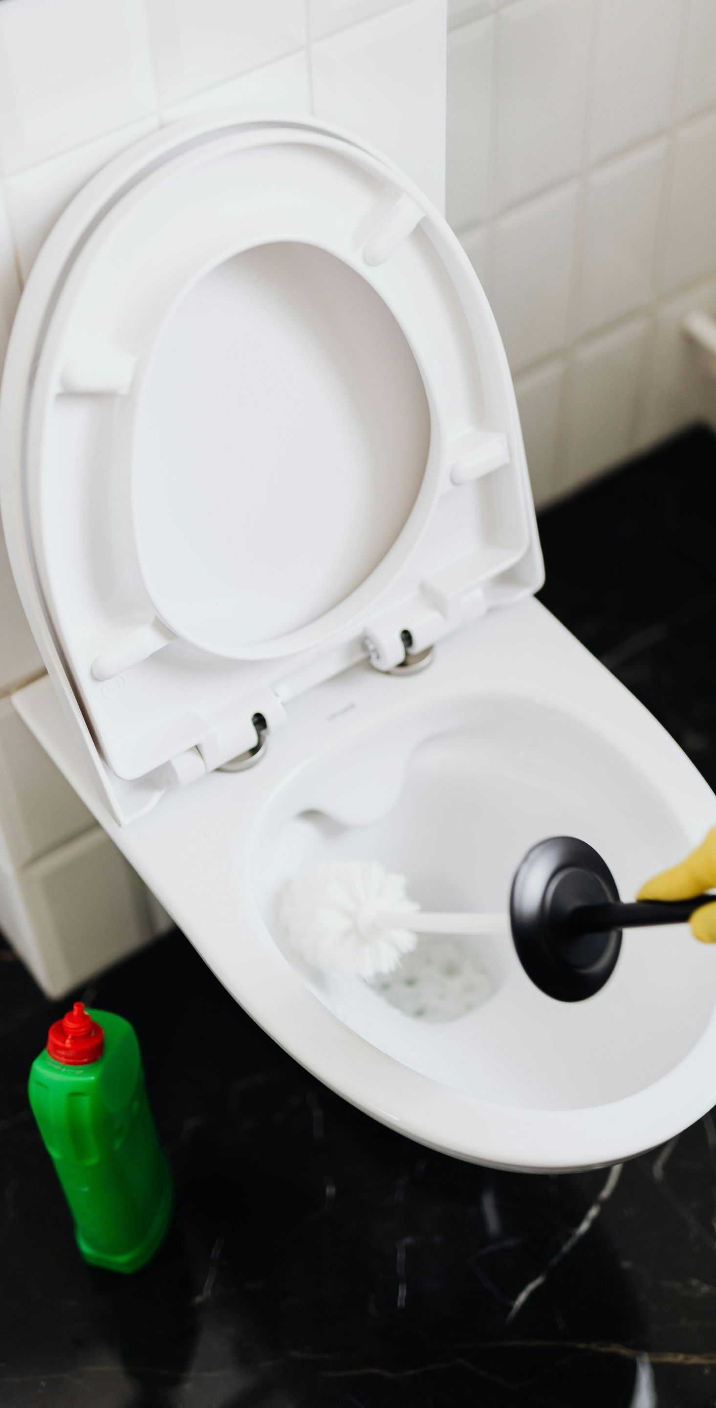 cleaning a toilet