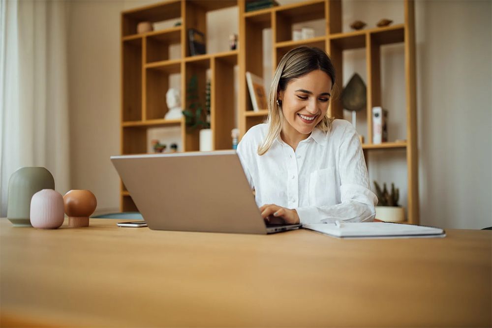 Woman Using Laptop