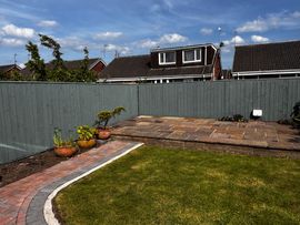 Sage green fance pressure washed and painted by Hedon Exterior Cleaning in Beverley, Hull