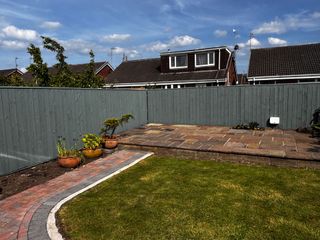 Sage green fance pressure washed and painted by Hedon Exterior Cleaning in Beverley, Hull