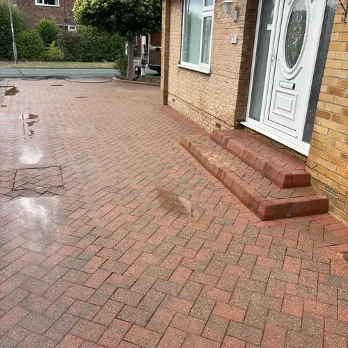Our driveway cleaners have freshly cleaned this block paved driveway to restore the original colours.
