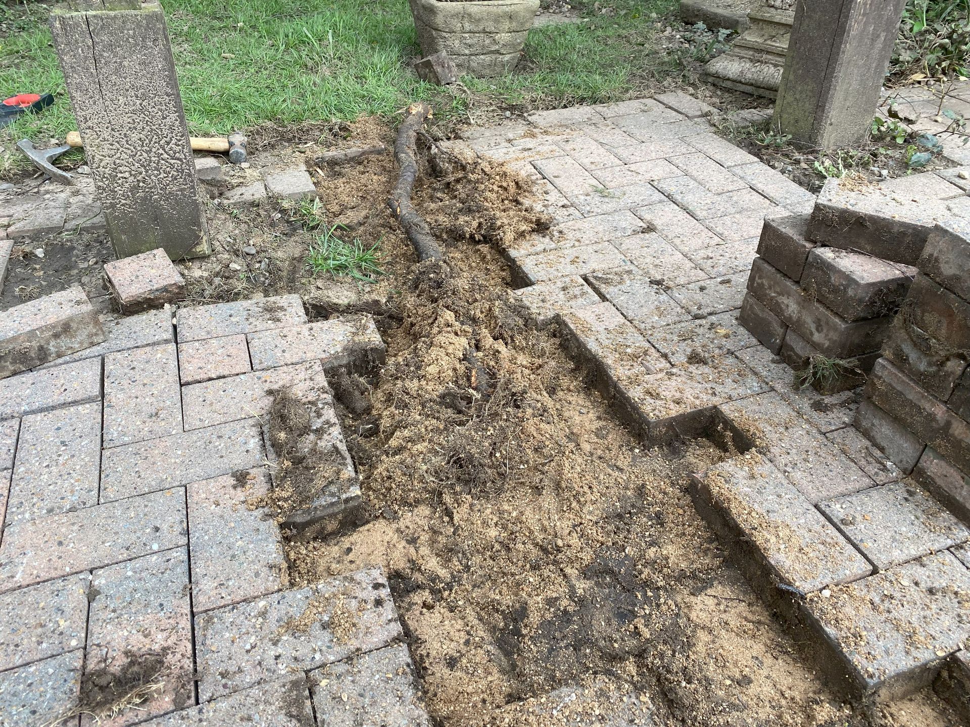 Repairs to block paving before pressure washing and cleaning