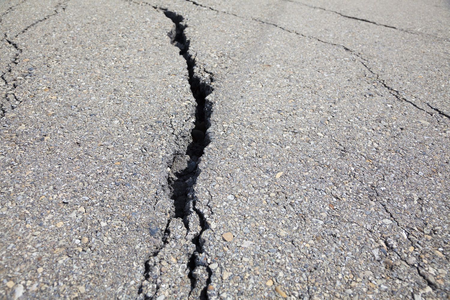 Cracked tarmac driveway