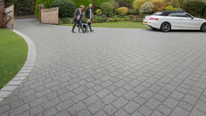 Block paved driveway cleaning near Hull. Red blocks and a comparison between dirty and clean