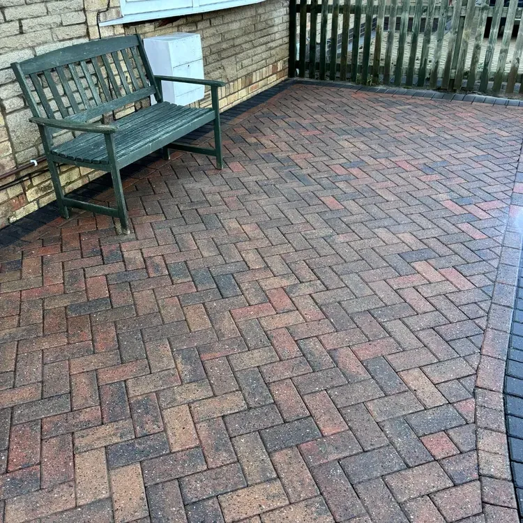 Block paved driveway after professional pressure washing