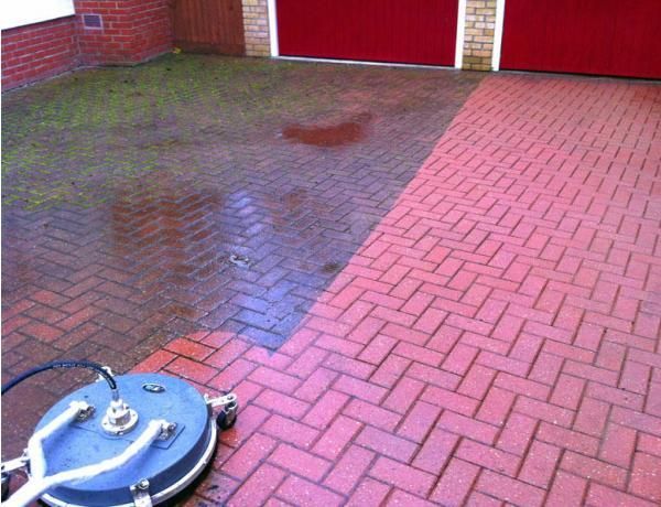 Red driveway pressure washing service