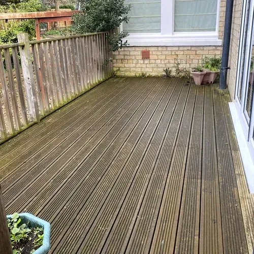 Weathered timber decking with algae and dirt before professional cleaning in Hessle, Hull