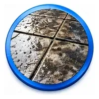 Dirt and weathering built up on outdoor patio paving