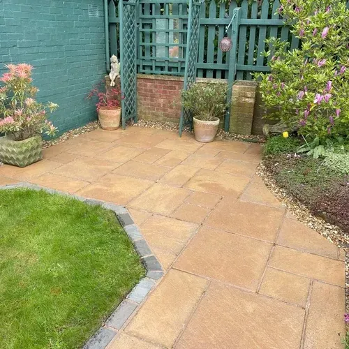 Clean concrete flagstone patio after professional patio cleaning