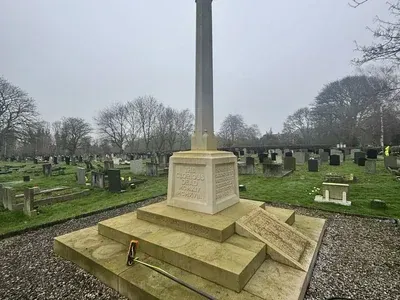 Hedon Cenotaph showing green organic growth before cleaning and restoration