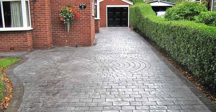 Imprinted concrete sealer: Precision application of protective sealant on stamped concrete surfaces, enhancing patterns and colors for a durable and vibrant appearance