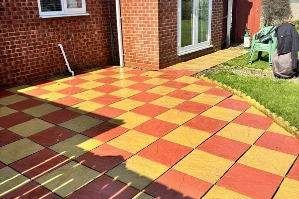 Clean red and yellow paved patio after professional patio cleaning in Withernsea
