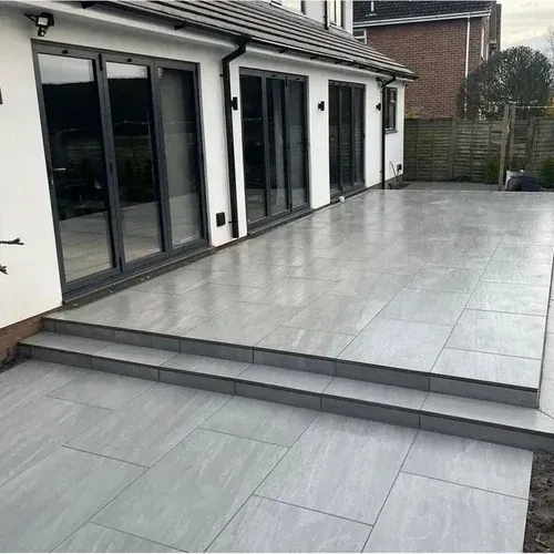 Clean grey porcelain patio after professional patio cleaning