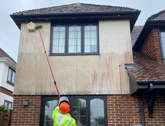 Operative cleaning render wearing PPE and using a soft brush