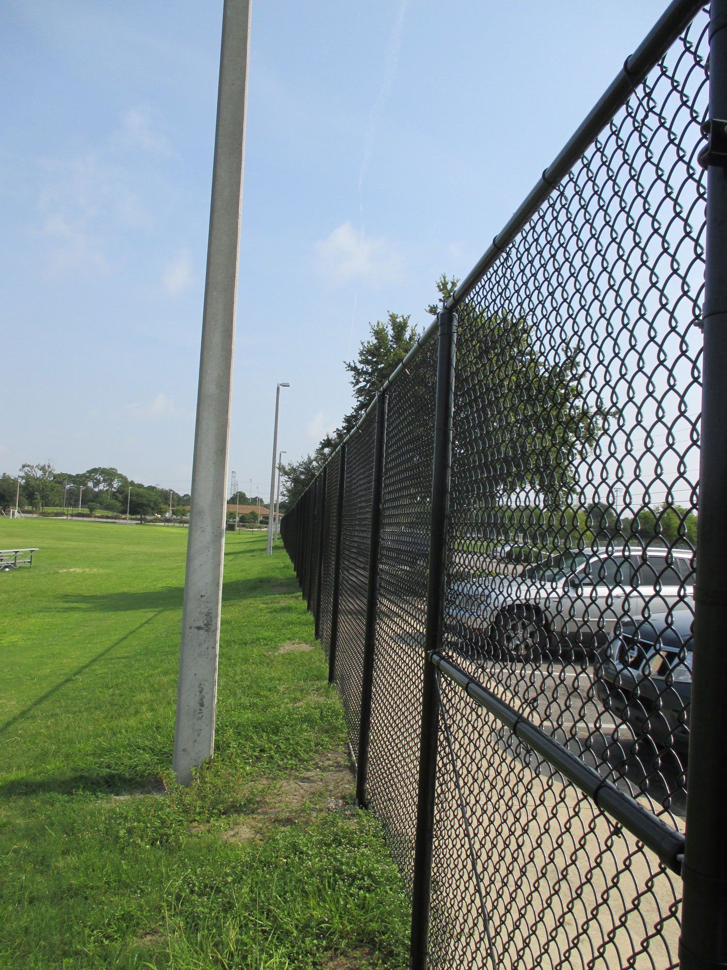 Black Vinyl Chain Link 9 Gage Core — Jacksonville, FL — Newsom Fence