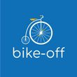 Disegno minimalista a linee blu di una persona in posizione aerodinamica che pedala su una bicicletta.