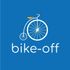 Disegno minimalista a linee blu di una persona in posizione aerodinamica che pedala su una bicicletta.