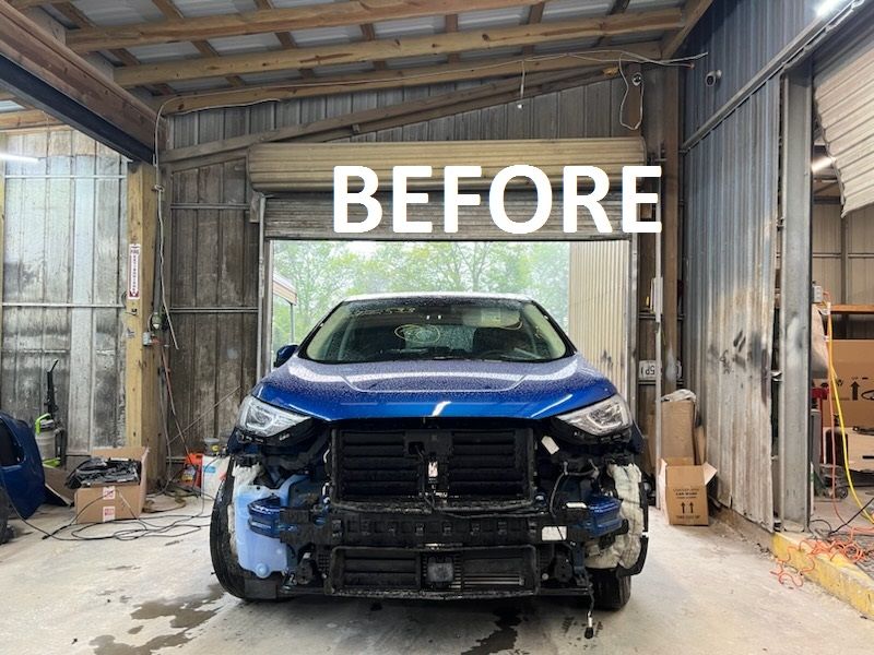 Damaged blue car front in a garage, labeled “BEFORE”