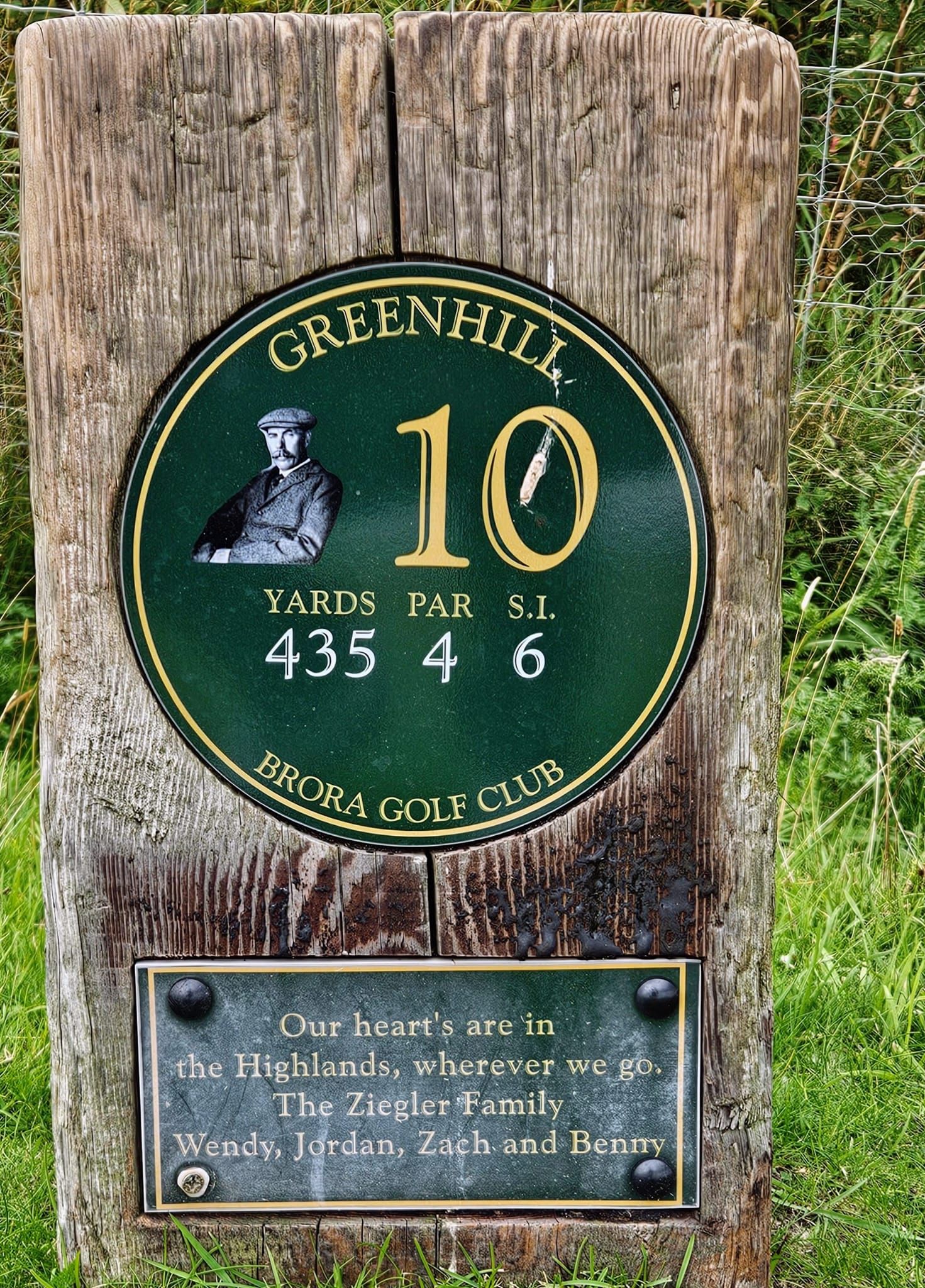 Golf Country book cover on a gray surface, showing a golfer and golf course scene.