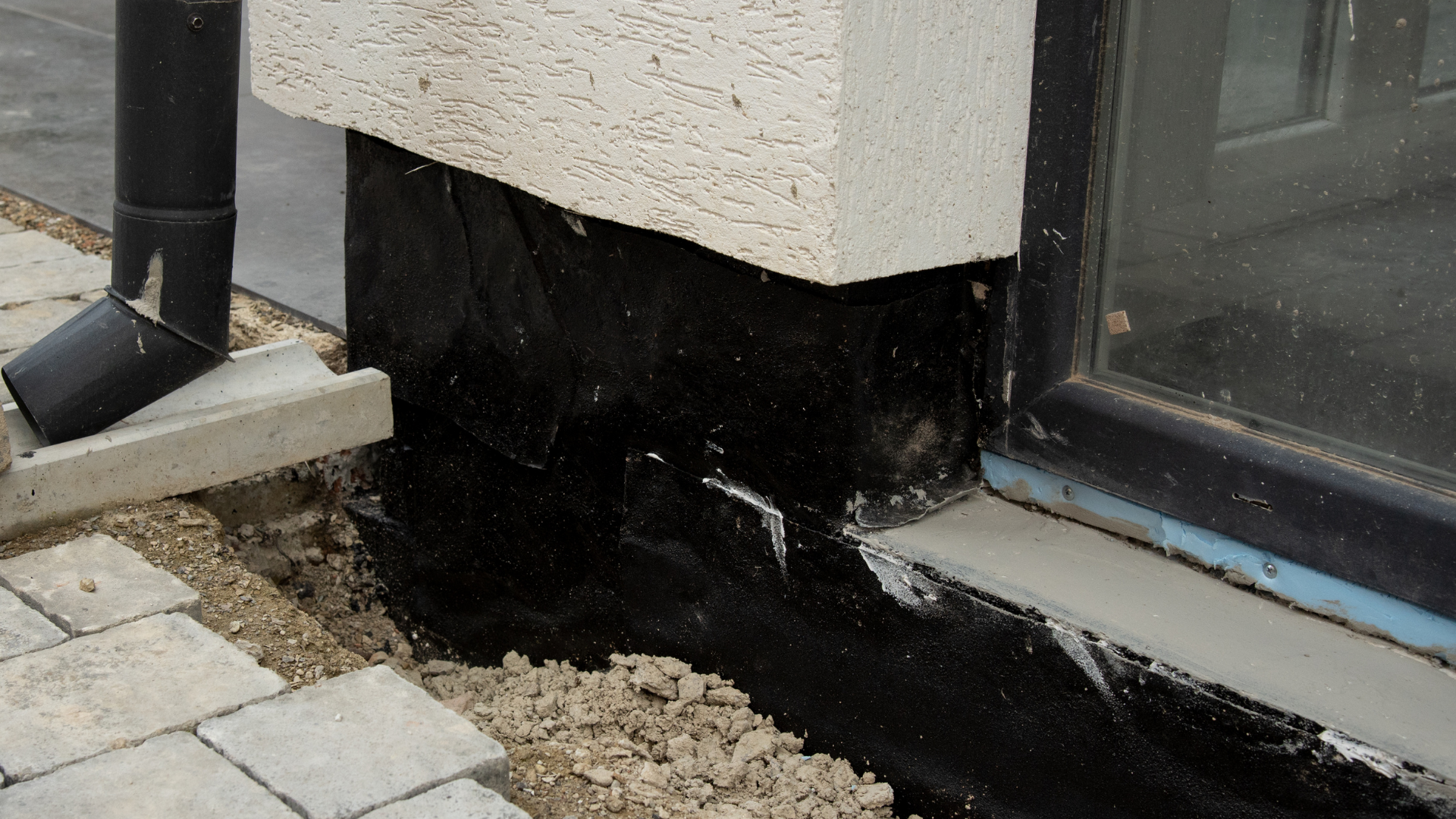Basement wall waterproof coating applied to protect against moisture