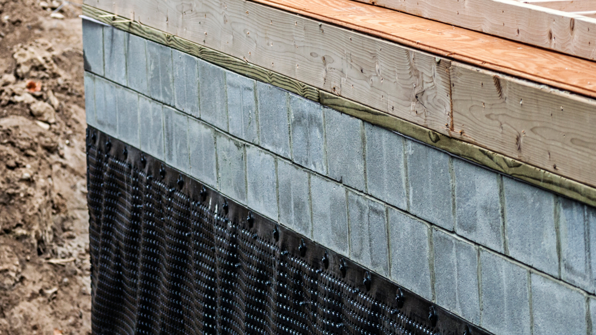 Foundation waterproofing work protecting home structure from water intrusion