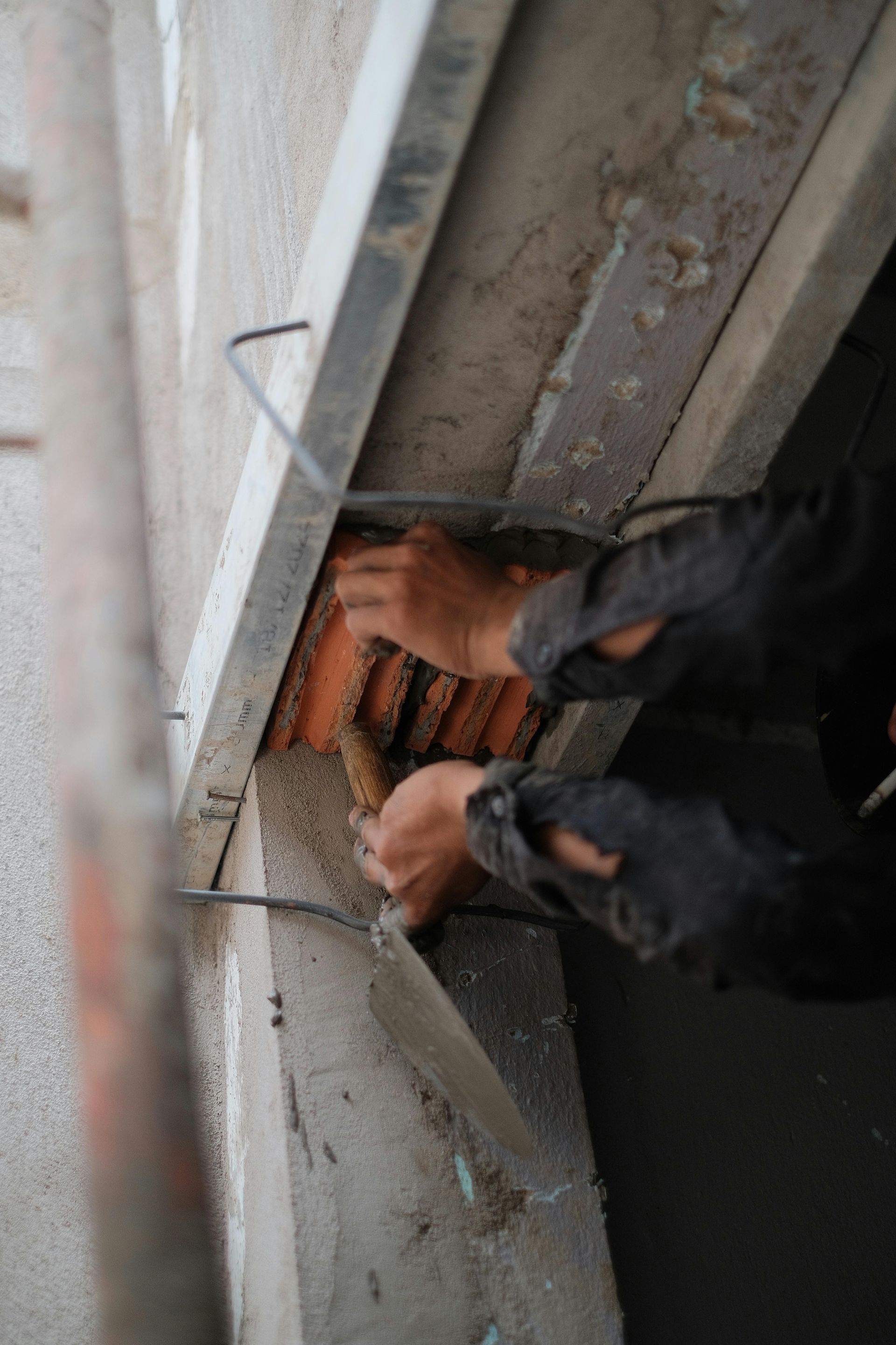 Foundation repair specialists stabilizing structure with proper reinforcement