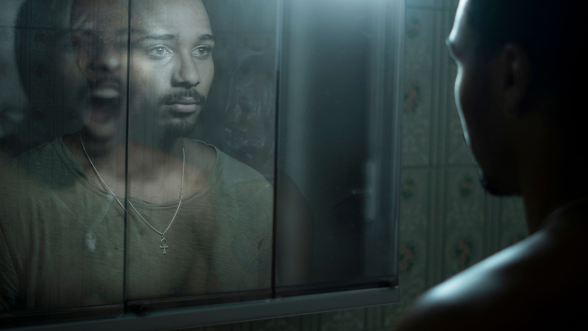 man front mirror observing his deepest