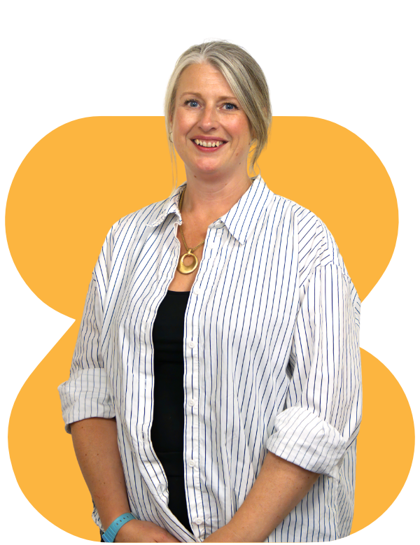 Smiling person in striped shirt and black top against a white background with orange shapes