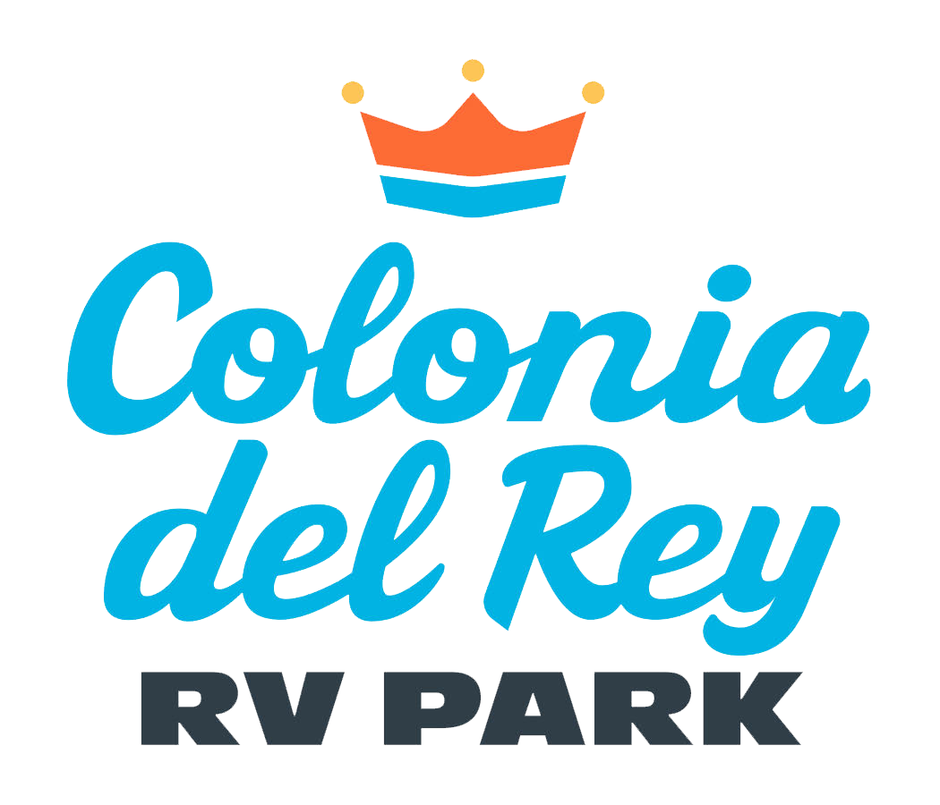The logo for corpus christi rv resorts shows a camper in the ocean.