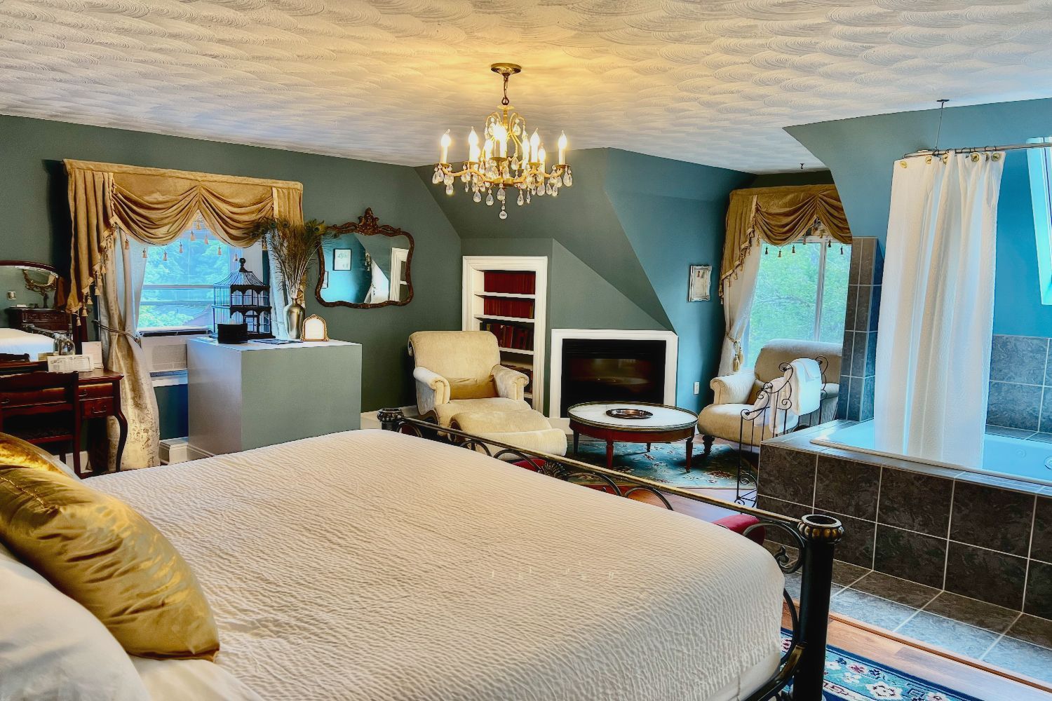 There is a large bed in the middle of the room.