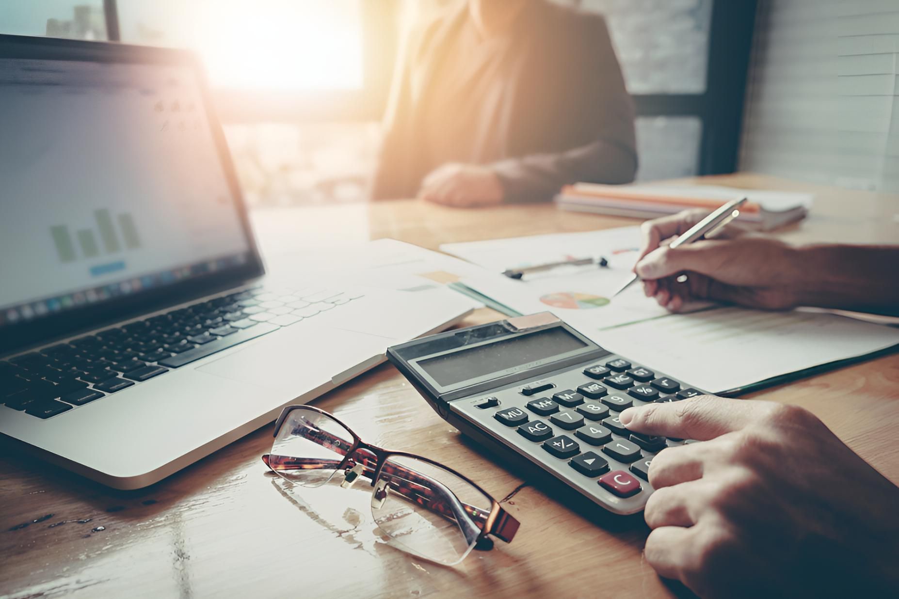 Man Computing a Payroll — Darling Downs Bookkeeping Company in Toowoomba City, QLD