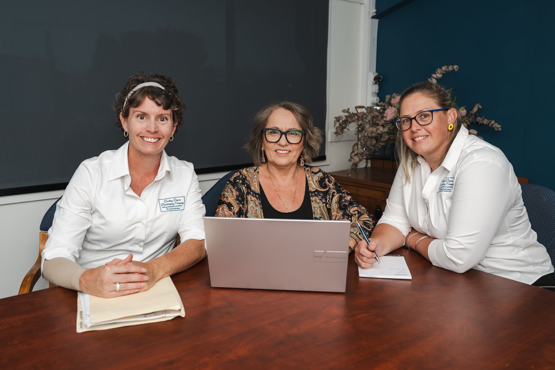 Desk With Binders, Calculator, and a Pen — Darling Downs Bookkeeping Company in Toowoomba City, QLD