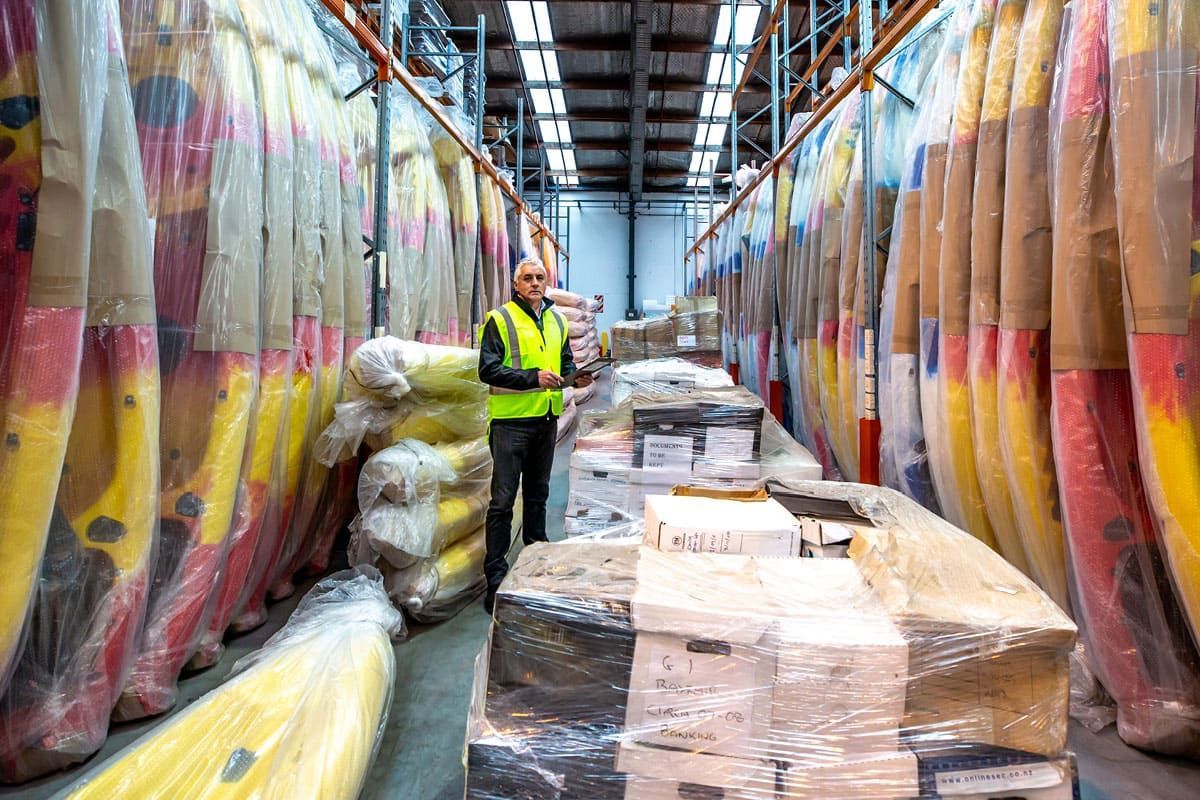 GO worker with kayaks