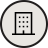 A building icon with windows inside a circle.