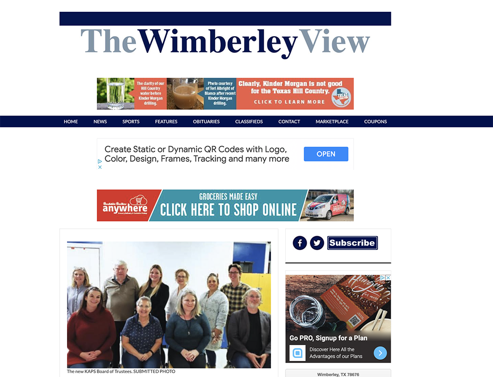 A group of people are posing for a picture on the wimberley view website.