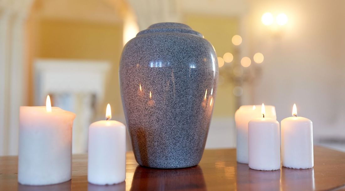 candele della sala del commiato a Parma