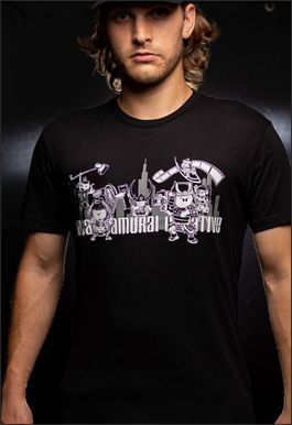 Man in black t-shirt featuring a stylized graphic of city skyline with the words 