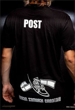 Person wearing a black t-shirt with 