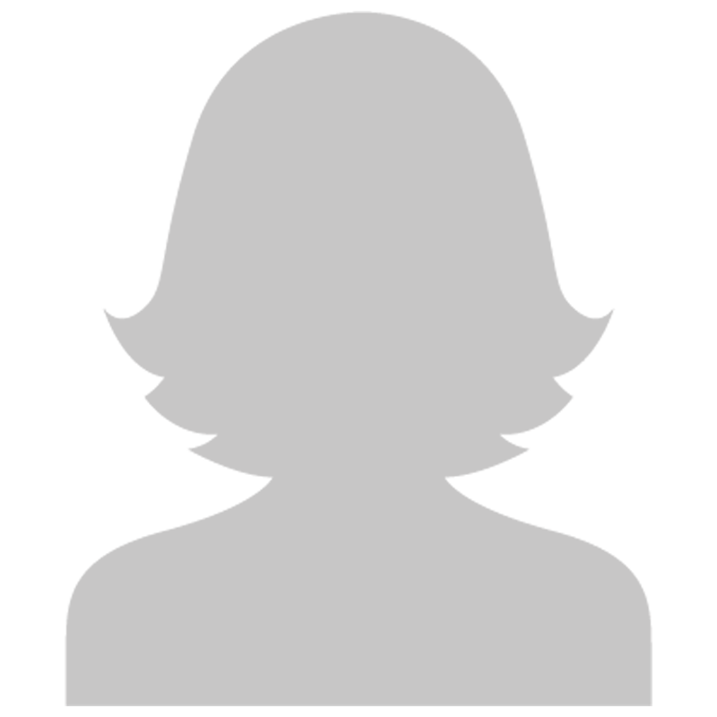 Silhouette of a person with short hair, shoulders, and chest, in gray.