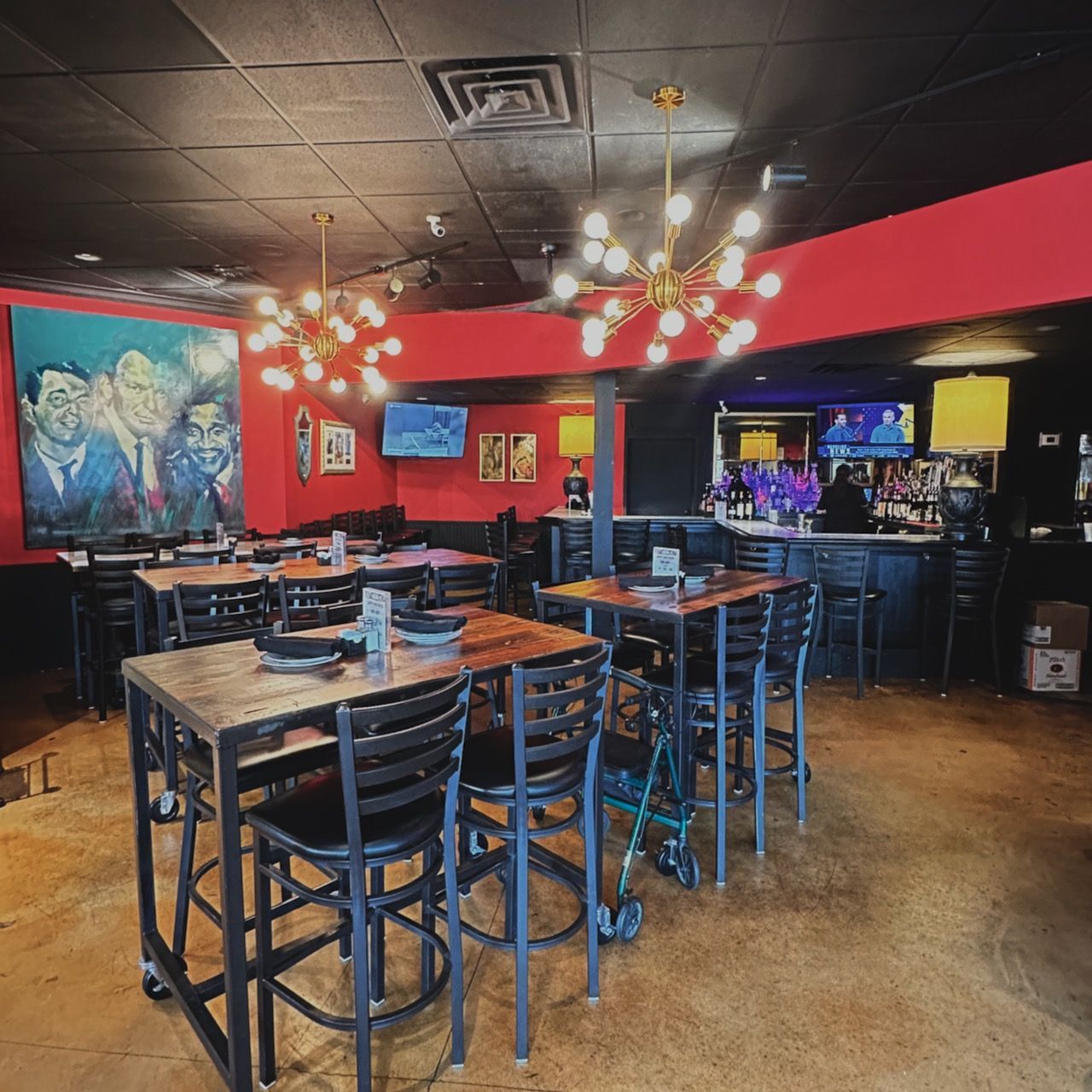 a restaurant with tables and chairs and a bar