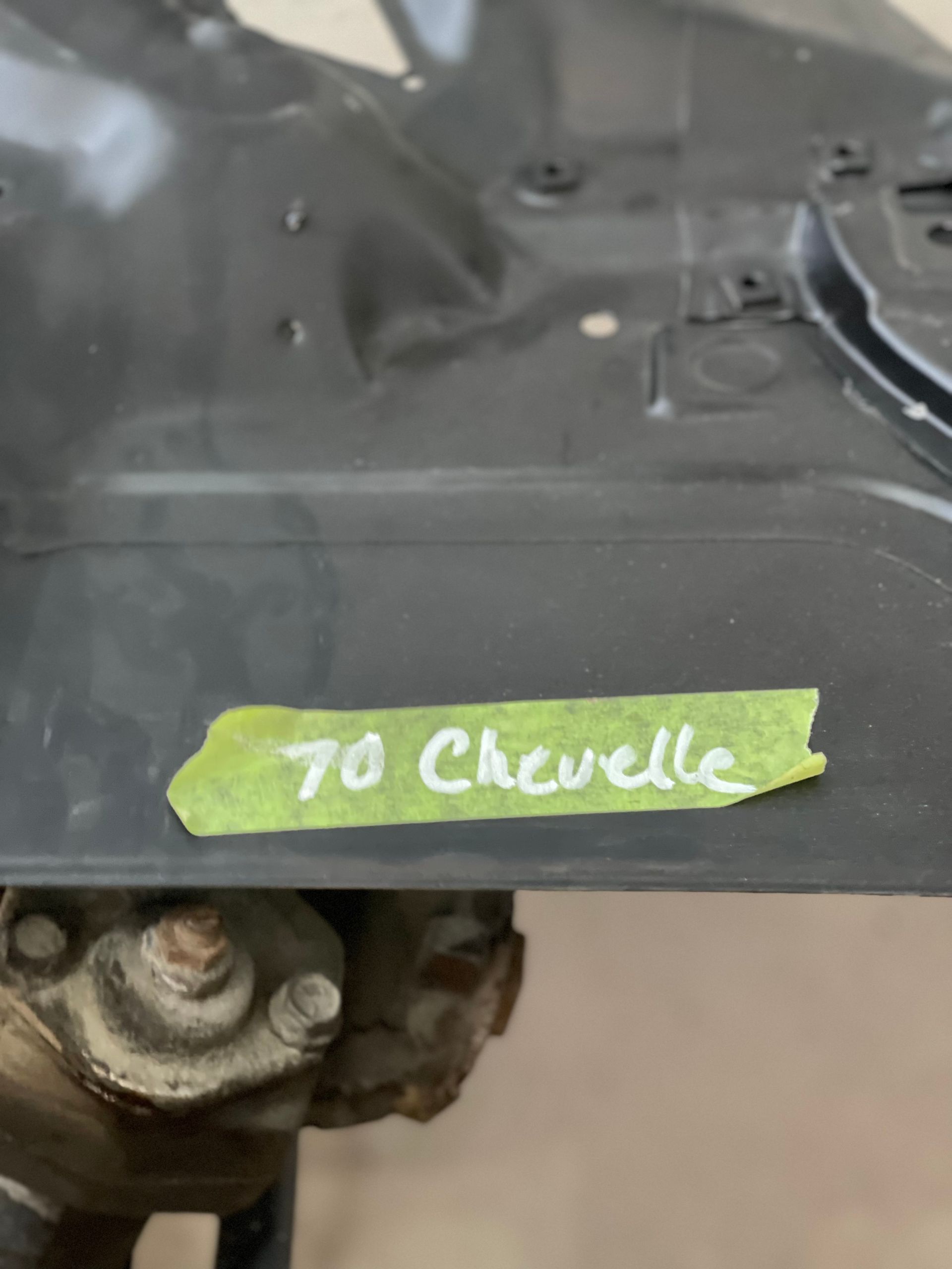 A piece of green tape has the word chevelle written on it