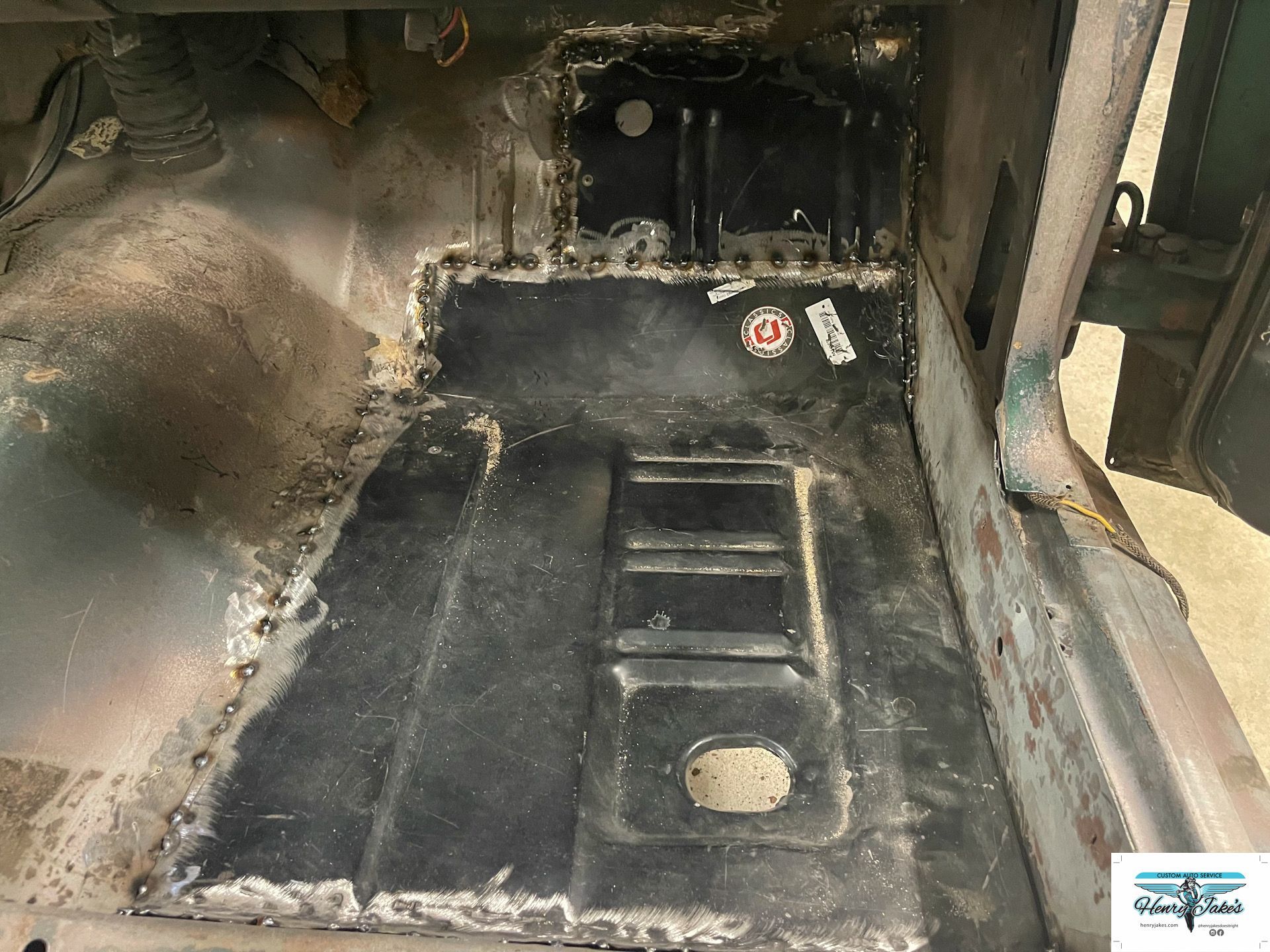 A picture of the inside of a car that is being restored.