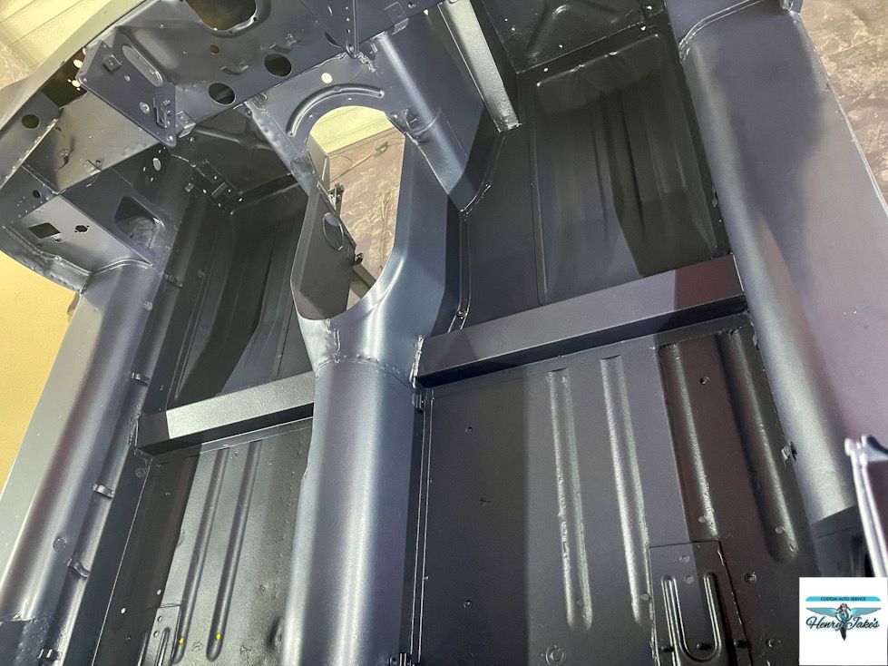 The inside of a car that has been painted black.