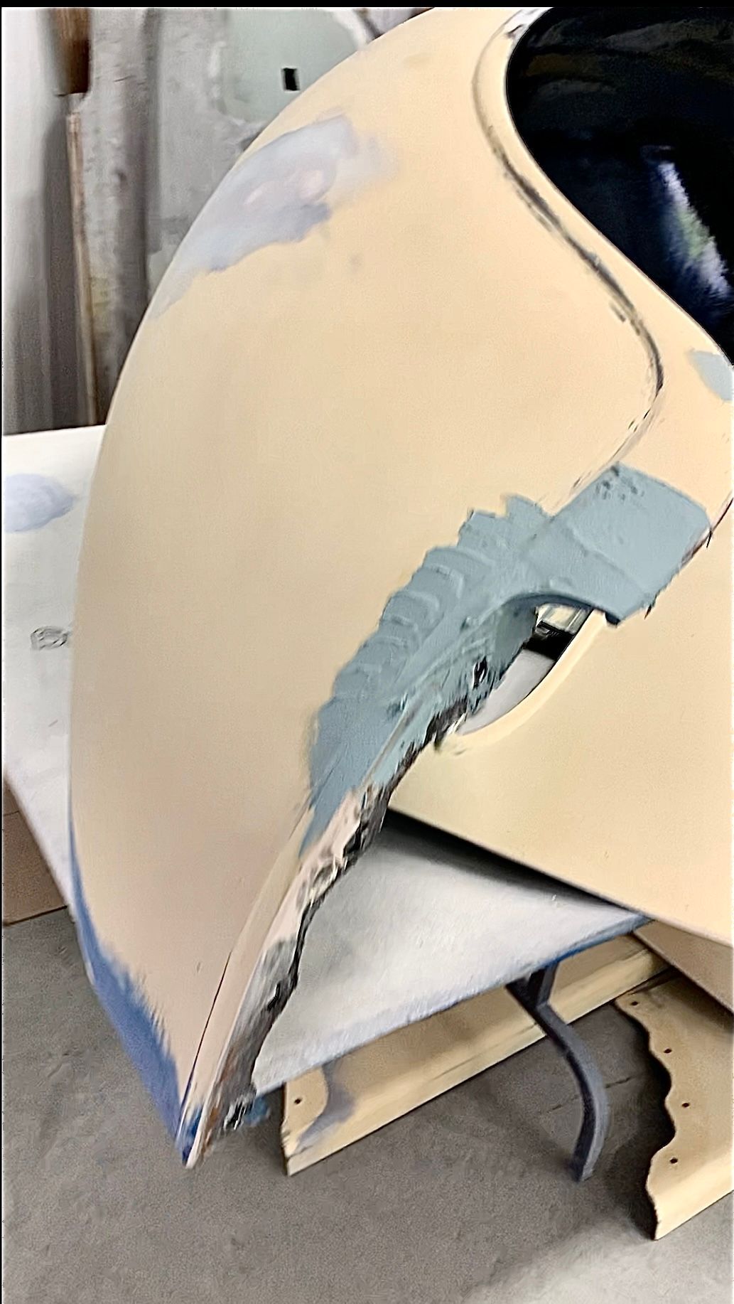 A close up of a piece of plastic sitting on top of a table.