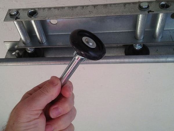 How to Replace Your Garage Door's Bottom Rollers How to Replace Your Garage Door's Bottom Rollers