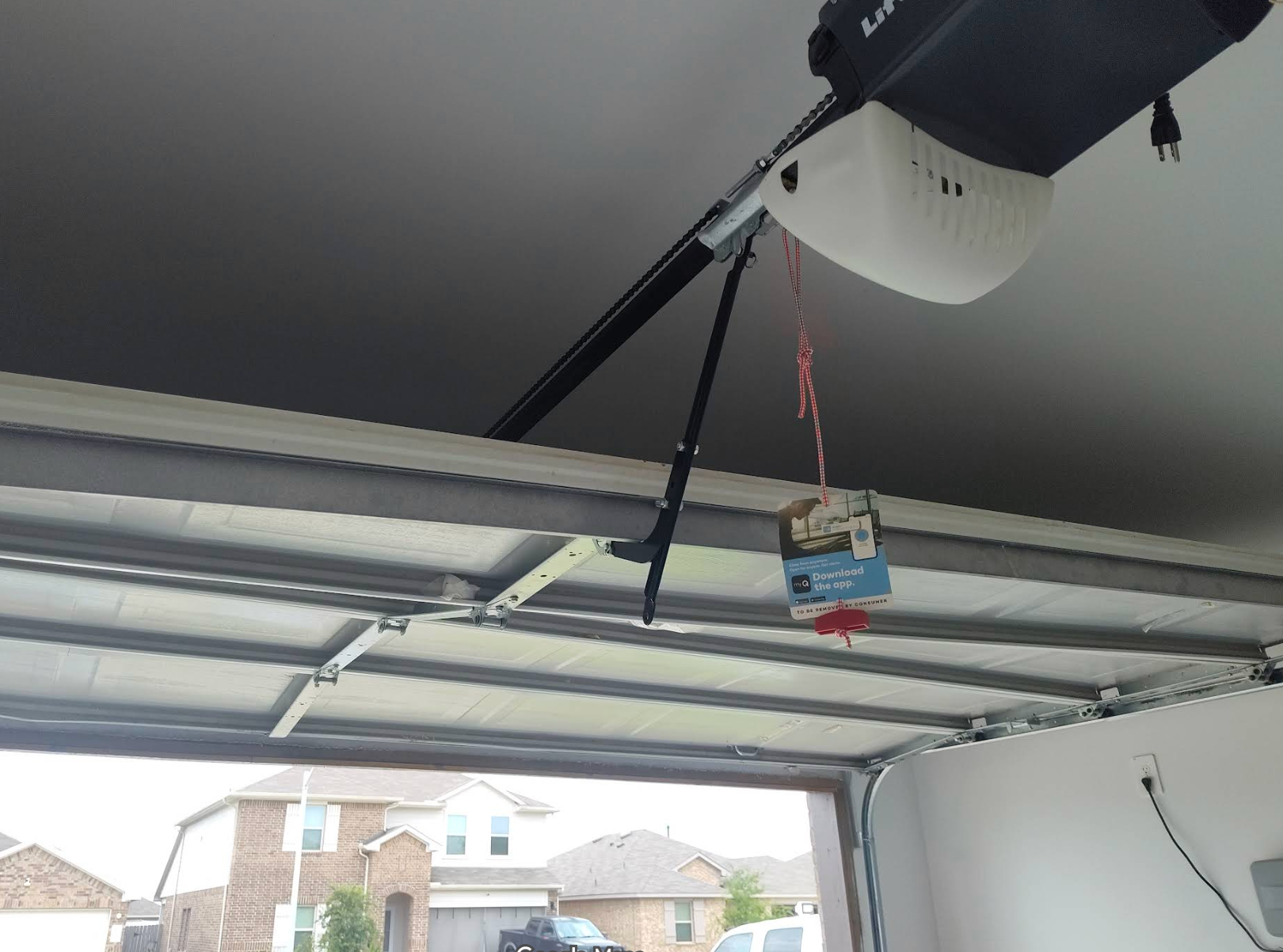Completed garage door repair and installation at a Conroe, TX home