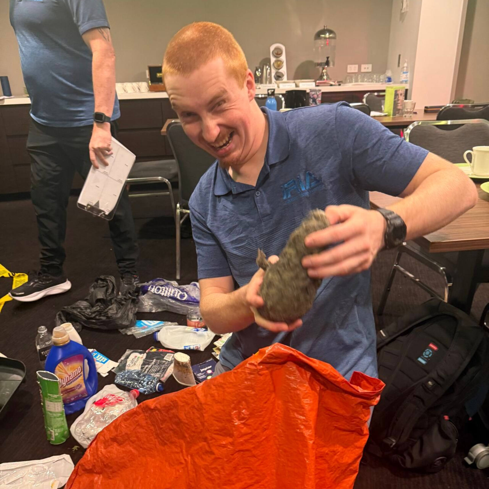 a man holding a crime scene prop