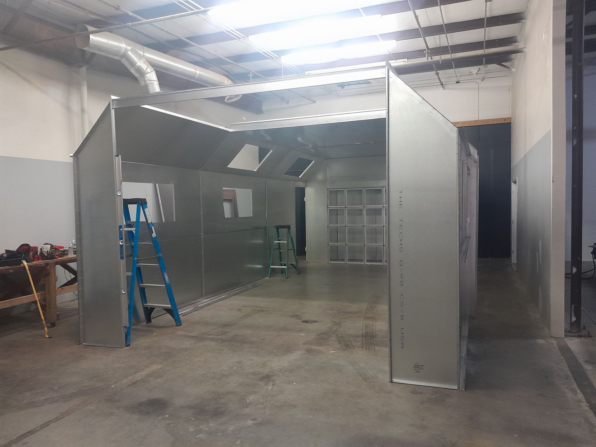 There is a ladder in the middle of the room.