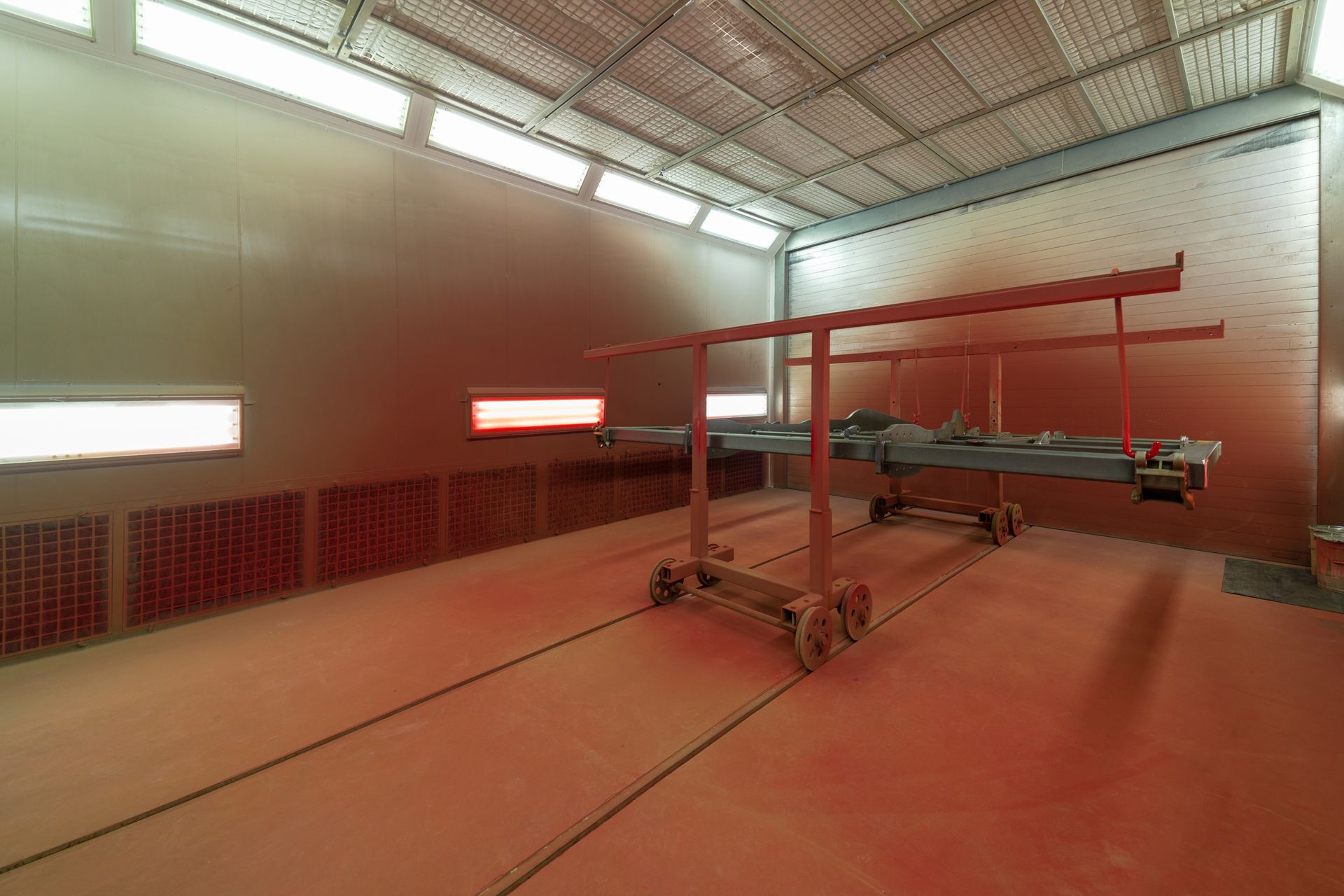 A room with a lot of red paint on the floor and walls.