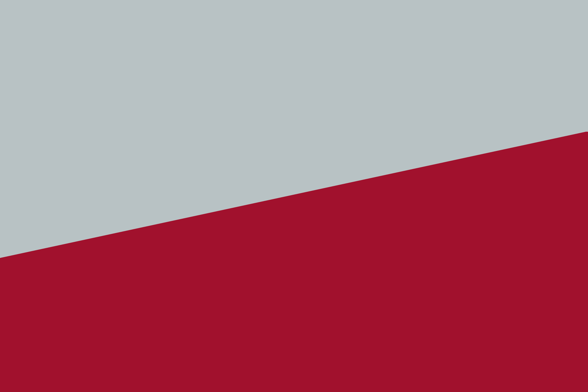 A rectangular field split diagonally from the bottom left to top right, featuring light gray on top and dark red below.
